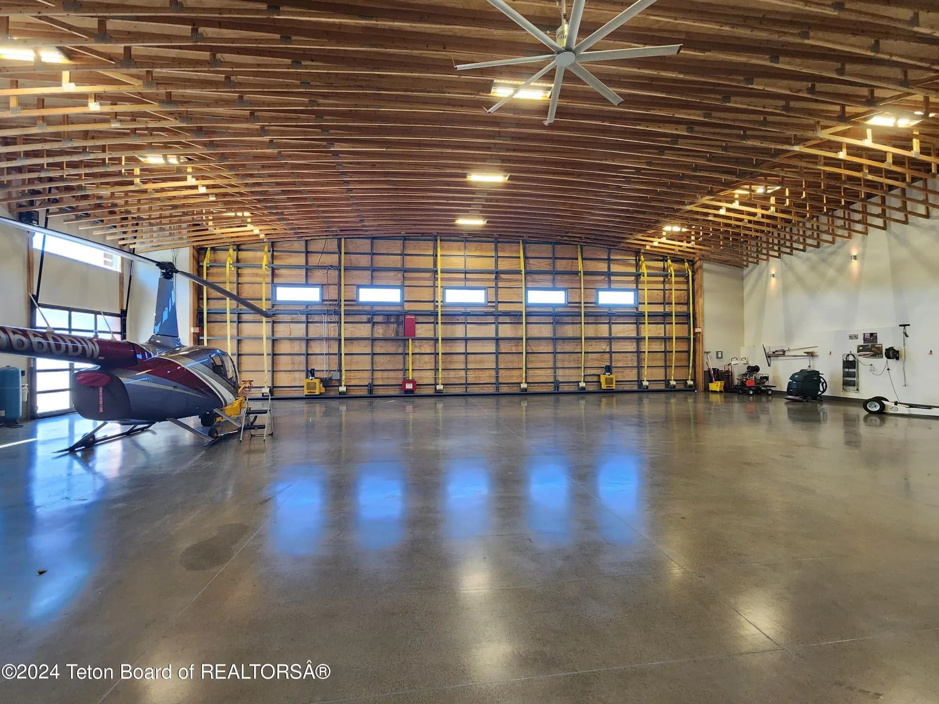 Interior of the 80 by 75 foot aircraft hangar at 872 Alpine Village Loop